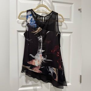 White House Black Market, gently used, size small. Asymmetrical design.